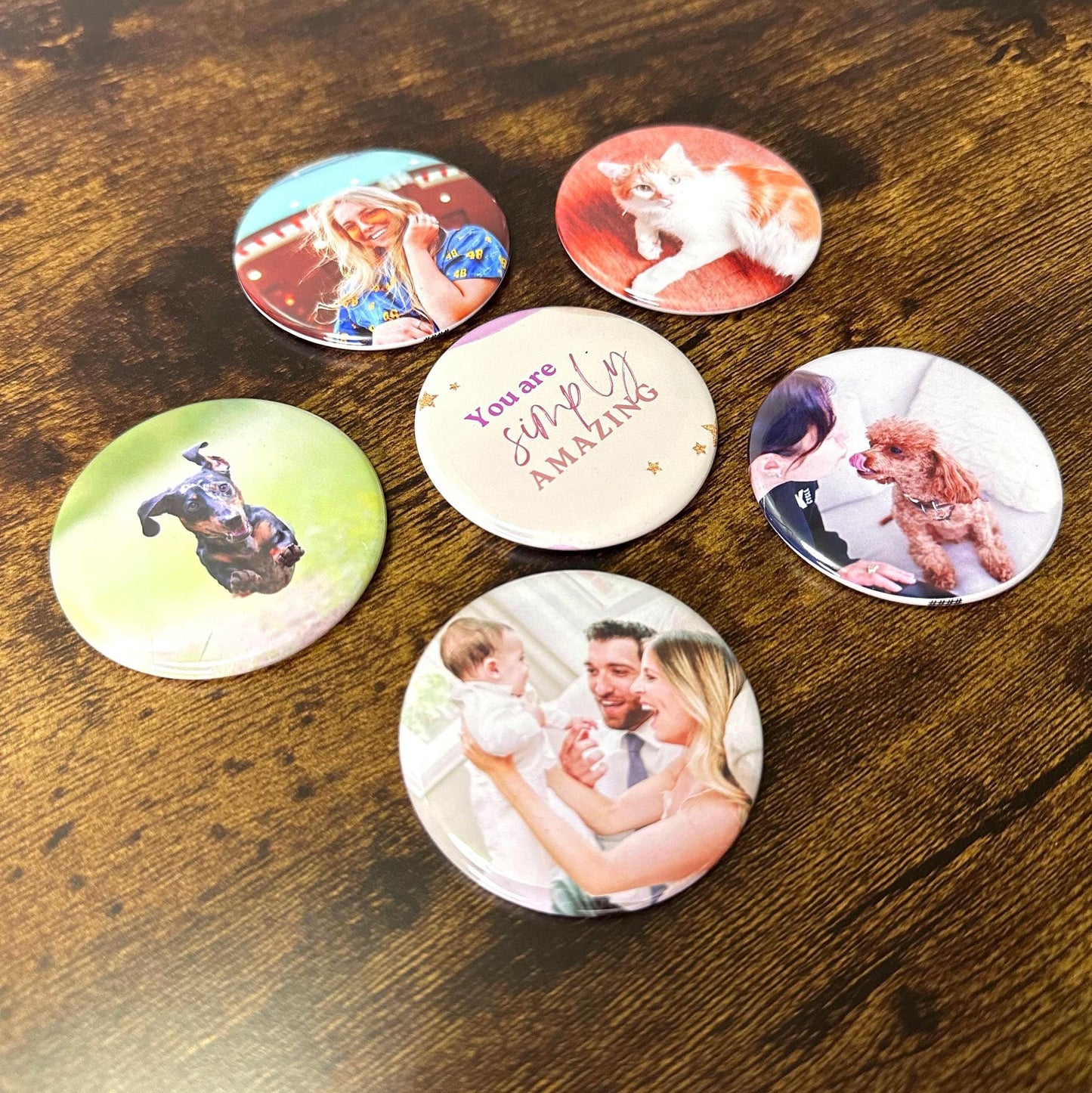 Set of round photo buttons on a wooden surface. gift for him and her