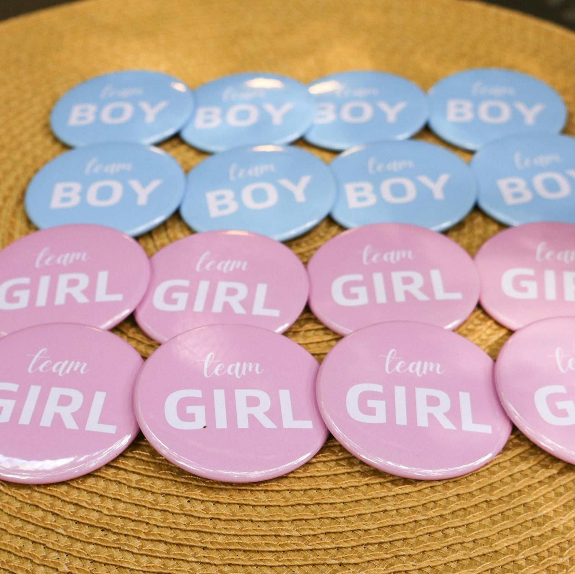 Gender reveal pins labeled 'Team Boy' and 'Team Girl'. Baby shower pins